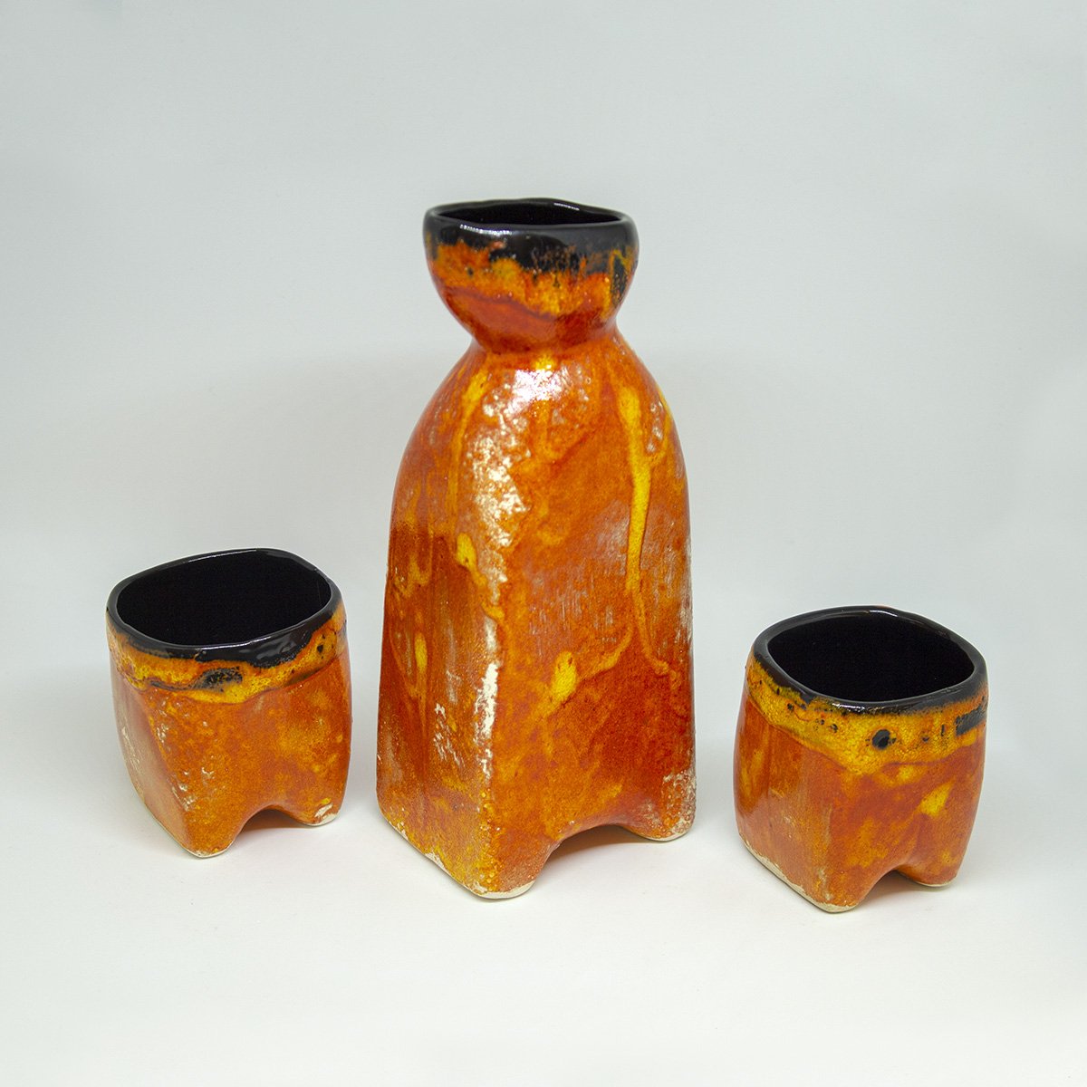 dast drinking set orange and black - een stip